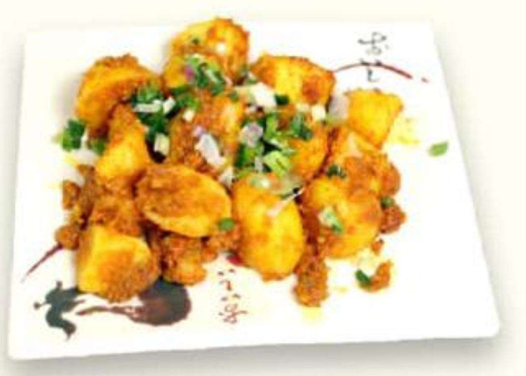 Aloodum served on a white plate against a white background.