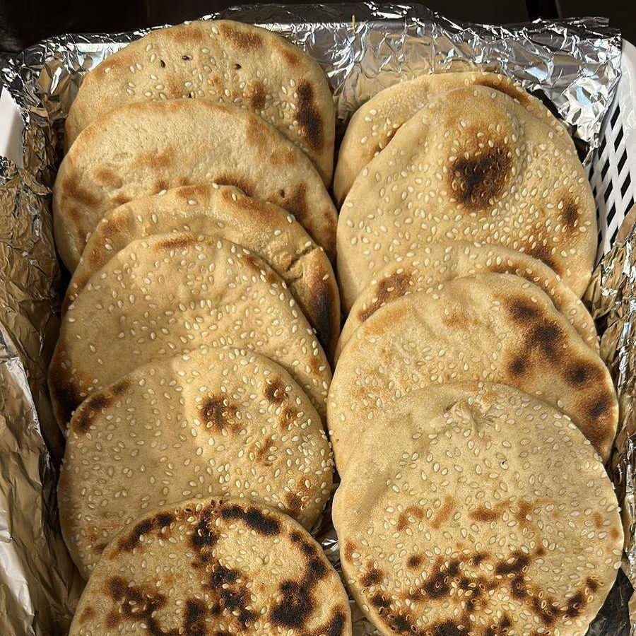 Fresh Whole Wheat Tibetan Brown Bread, ready in a serving platter.